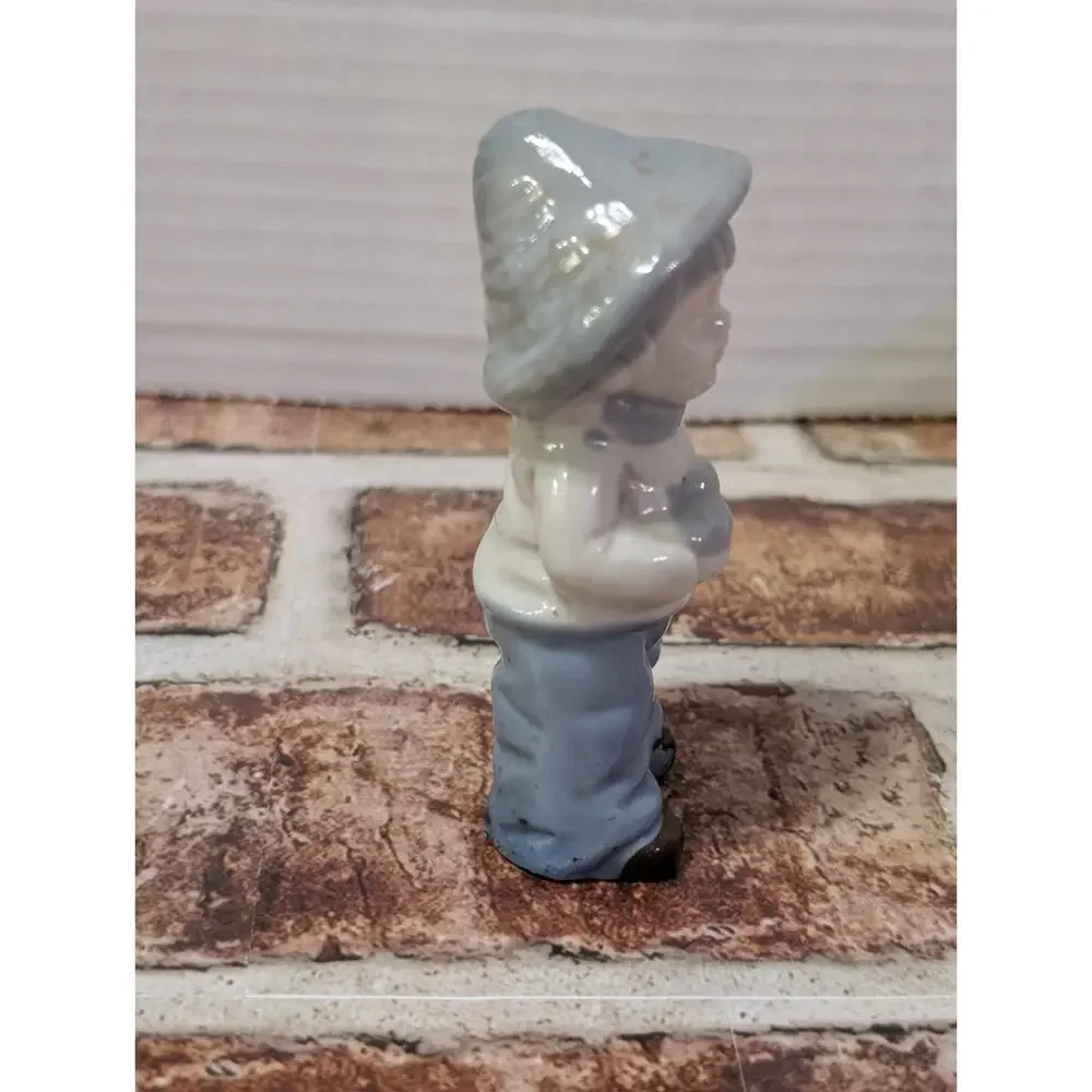 Dutch Vintage Farm Boy Holding Bird Porcelain Ceramic Mini Figurine Figure